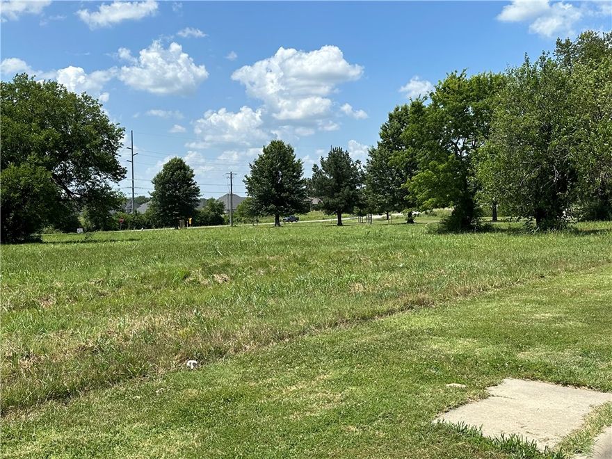 This property stands out for its flexibility—whether you're thinking commercial, residential, business in the front & residential in the back, or multifamily, the options are wide open in a high-growth corridor  Just minutes from XNA Airport, the Walmart Distribution Center, and Downtown Bentonville, it's ideally situated in a fast-growing area surrounded by neighborhoods, apartments, and warehouses. Zoned agriculture; all development plans and sewer tap access must be confirmed with the city. This is a rare chance to shape a space that fits your vision. House has NO Value, Not Livable, property is sold as-is.  Preliminary design layouts for the property are attached.