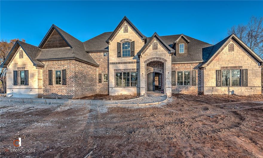 Bentonville Schools! Check out this new construction home in Copper Ridge by Capstone Design Build conveniently located near I-49 and the future 8th Street off ramp! Coffered ceilings, built ins and amazing high quality features! 1.02 acre level lot, 5 bedroom/4 full baths and 2 half baths, amazing kitchen and formal dining room, fireplace in master, bonus room, media room, study, butler's pantry, outdoor covered patio and SO much more!