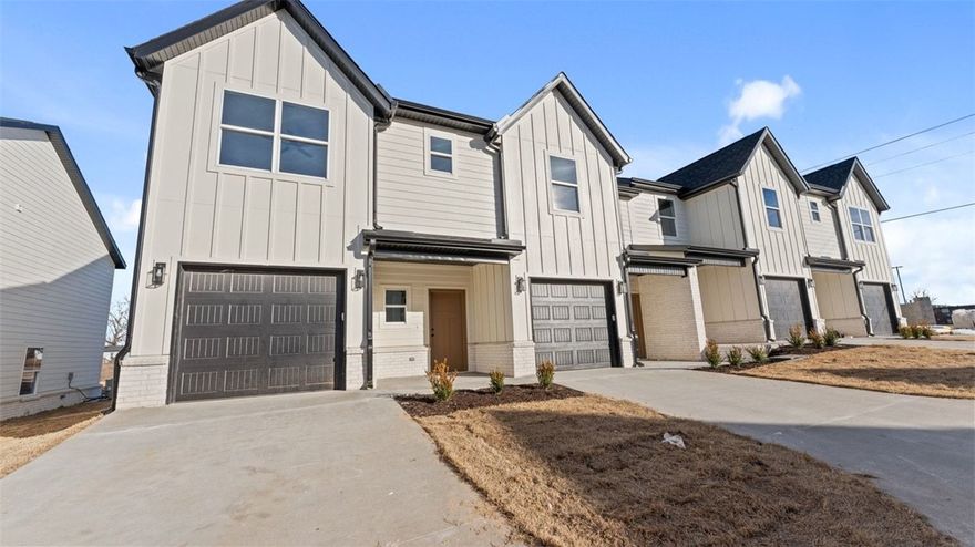 Newly constructed town home in the growing community of Pea Ridge, Arkansas. Ideally located just minutes from both Bentonville and Rogers, this property offers convenient access to shopping, dining, schools, parks, and everyday amenities while maintaining the charm of a small-town setting. Each thoughtfully designed home features three bedrooms and two and a half bathrooms with a bright, open-concept layout that maximizes space and comfort. Quality finishes throughout include custom cabinetry, luxury vinyl plank flooring, quartz countertops, and EV charging ports. Designed with both style and functionality in mind, these town homes offer modern living in a desirable Northwest Arkansas location.