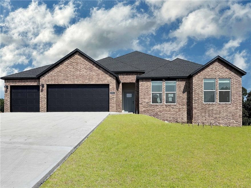 Exquisite Eureka plan with a 3-car garage in Monitor Meadows, where you'll experience modern luxury in Springdale, Arkansas. Our meticulously crafted floor plans provide ample space for you to grow and thrive. Beautiful Quartz countertops in the kitchen with tile backsplash and 42-inch upper cabinets. Oversized island per plan. Black plumbing fixtures throughout! LED lighting throughout! Ceiling fan in the living room and bedrooms! Living room will have and a modern electric fireplace with a poplar mantle. Bedroom one has a fabulous en suite with an oversized walk-in shower with tiled walls, elongated commode and quartz countertops with dual sinks. Back door is a full lite glass with mini blinds. Approximately 1 acre lots!!   Septic sewer and Private Streets.
