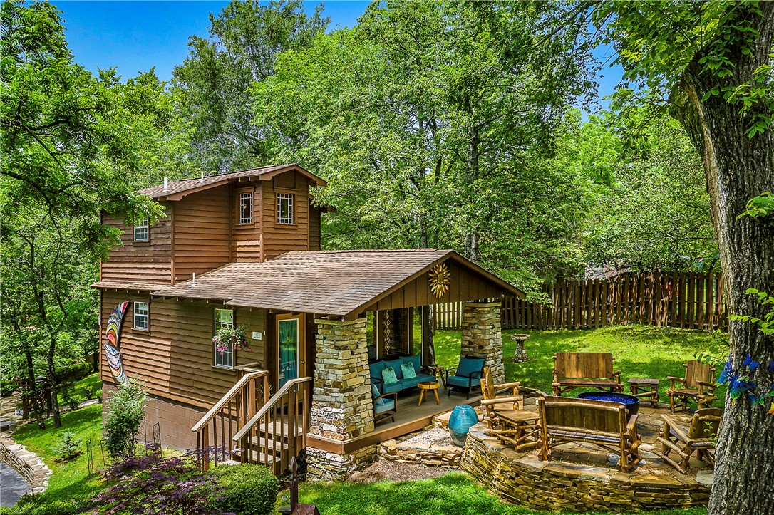 The Woods Cabins is a lodging property with five cabins, comprising 5 individual guest units within a short walk of downtown Eureka Springs, AR. Located on one acre of pristine and well manicured property, the Woods Cabins is a 5 star resort with impressive accommodations including inside the units and on the grounds.The guests can enjoy a large, detached screened gazebo with a 6 ½ā octagonal hot tub. Wow! As well as a gorgeous fire pit to relax at the end of the day. Once you have stayed at The Woods Cabins, you will return time and time again. The owners have done an outstanding job of providing cozy yet elegance throughout. Importantly, the ownerās residence at the property is a very well sited two bedroom, one bath home with a full kitchen, living room, office, and deck. The combination makes this a very desirable property for someone wanting a viable small business and a great home to live in. 2023 Travelers Choice awarded by TripAdvisor! Top 10% globally!