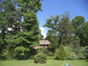 859 Stonegate Drive - Custom brick home on very private 2+ acres. Exceptional landscaping, creek, stone bridge, sprinkler & alarm system, stone pathways, arbors, potting shed, RV parking, outdoor shower. Outside antique dinner bell and gate to garden do not convey. REDUCED to $319,000 mls# 16-1290