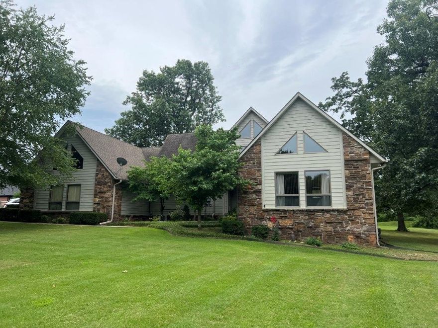 4 bedroom 3.5 bath, 4.47(+/-) acres. Master downstairs. Interior super maintained. All custom hardwood cabinets and trim work. All windows and doors wood framed. Wood stove vented and heats master bedroom and media room. Beautiful park like yard. Wheelchair lift on back staircase needs some repair.