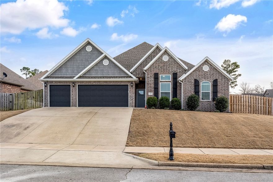 Beautifully maintained home featuring a large living room that opens to a spacious  kitchen. Custom trim work, upgraded lighting, and beautiful wood flooring throughout. The fully insulated garage offers smart garage door openers with a camera and generous attic storage. Enjoy instant hot water and a large laundry room with ample cabinetry. Move-in ready with thoughtful upgrades throughout. Conveniently located near Pinnacle, the Promenade, and downtown Rogers with easy access to shopping, dining, and entertainment.