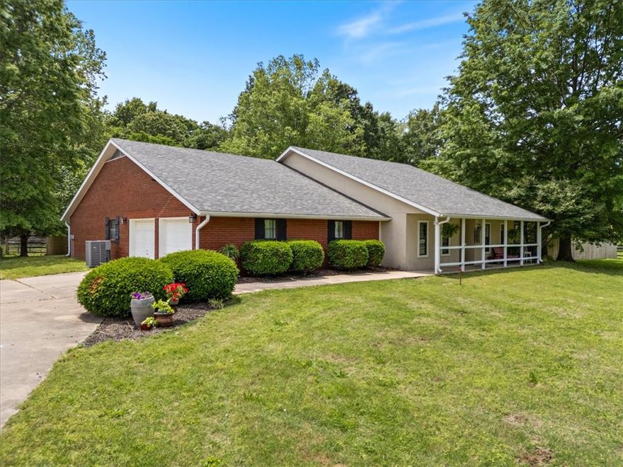 Seller to offer 10K in buyer concessions toward rate buy down or credit for closing costs or prepaids.  Additional 5K in Preferred lender credit to buyer.  Ask for details. A rare find! Stunning 6 acre ranch-style property offers the charm of country living w/city convenience.  3 generously sized bedrooms, 3 full bathrooms, formal dining and office. Newer roof & HVAC and appliances. A bright, open living w/cathedral ceilings & windows to bask in the natural light. Step outside to discover the covered patio & pool. A perfect way to enjoy friends/family. Tour the spacious guest house featuring a bedroom loft, bathroom and large space to entertain.  Quaint bridge over a wet-weather creek & pastureland ready for horses or non-commercial livestock w/split-rail fencing. This private retreat, close to town is something to see!