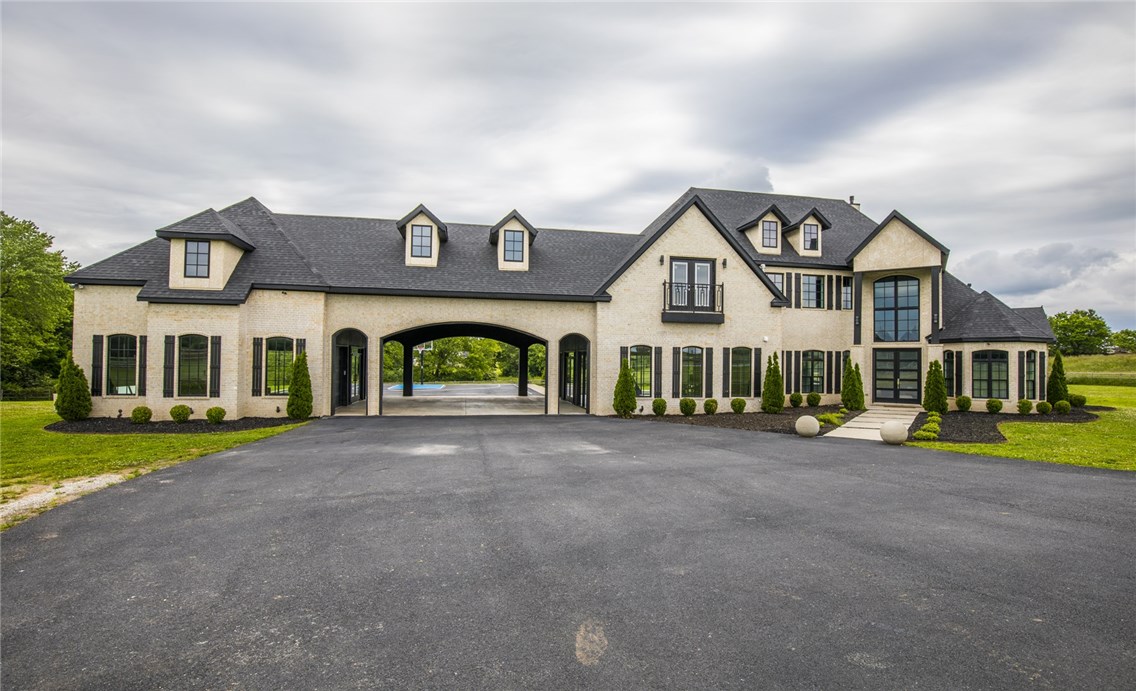 Amazing builders personal home! This remarkable custom estate home has it all - 3 acre lot, pool, basketball court, 3 car garage that can be made into 6 car, bonus/exercise room on main level & more. As you enter you'll be amazed by the attention to details. Custom wood staircase & wood trim throughout. Grand living room w/ high ceilings & windows, custom floor to ceiling fireplace tile, double sided fireplace. Chef's kitchen includes imported Italian counter-tops, seamless center island, commercial grade 6 burner stainless gas stove & vent hood, soft close cabinets, double stainless ovens, wine fridge, & two sinks. Spacious master bedroom w/ double french doors to back patio. Must see master bath w/ huge double shower w/ stand alone tub & river rock flooring, custom built master closet, separate toilet room w/ bidet. Exercise/bonus room on main level w/ separate HVAC unit (designed to be converted into 3 car garage). Separate heated & cooled 3 car garage. Large patio w/ 2 fire pits. Foam insulation, low utilities