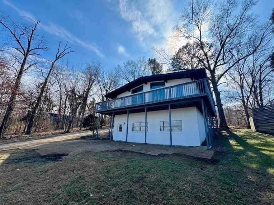 Nestled in the heart of Bella Vista, this property offers the perfect blend of comfort, privacy, and Northwest Arkansas charm with Beautiful Lake Views Year Round! This recently updated home has features like granite counter tops, beautiful wood flooring, new stainless steel appliances, new HVAC, new Hot Water Heater and enjoys access to scenic trails, golf courses, and lakes that make the area so special. With its peaceful setting, mature trees, and inviting curb appeal, the property provides a serene retreat while still being just minutes from shopping, dining, and all that the region has to offer. Whether you're seeking a full-time residence or a relaxing getaway, this property delivers the ideal balance of convenience and natural beauty.