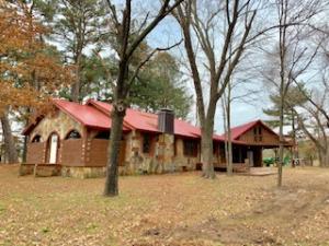 This unique home is completely remodeled and features a new roof, electrical updates, pex plumbing, HWH, metal roof, appliances and new kitchen cabinetry (shaker style), ventless, Gas FP, and bonus space connected to carport, and the large loft space could be workshop/man cave/game room/bonus room! Also offering a newer CHA unit, both front and rear sun decks, large shade trees, craftsman style trim, fireplace mantel, beautiful cabinetry, and an abundance of storage! Give us a call and we can take a look!