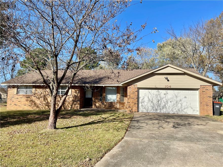 Welcome home to this charming 3 bed, 2 bath brick home in the heart of Springdale! Step inside to a warm, inviting living room with a classic brick hearth fireplace and enjoy an eat-in kitchen featuring granite counters and gas range. The formal dining room, complete with a lovely bay window, can also flex as a home office. Primary bath has a tiled shower and the guest bathroom features a tiled tub surround, plus the utility room with pantry adds everyday convenience. An extra exterior door to the garage and a storm door on the front add function and peace of mind. Outside, the spacious fenced backyard is shaded by mature trees and includes a covered patio perfect for relaxing or entertaining. A 2-car garage provides secure parking and storage. Wonderfully located near parks, Lake Fayetteville trails, schools, shopping, 0.7 miles from the Razorback Greenway, and more, this home offers comfort and a convenient location. Don’t miss it!