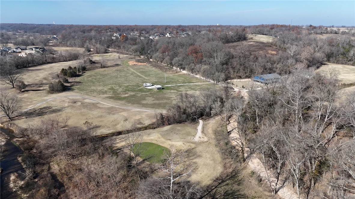 This property is located in a private, wooded setting near the Nole and Big Sugar Golf Course. It includes a new well that produces 15 gallons per minute and a recently installed 1,250-gallon septic tank. This is an ideal location to build your dream home that backs up to Hole #11.