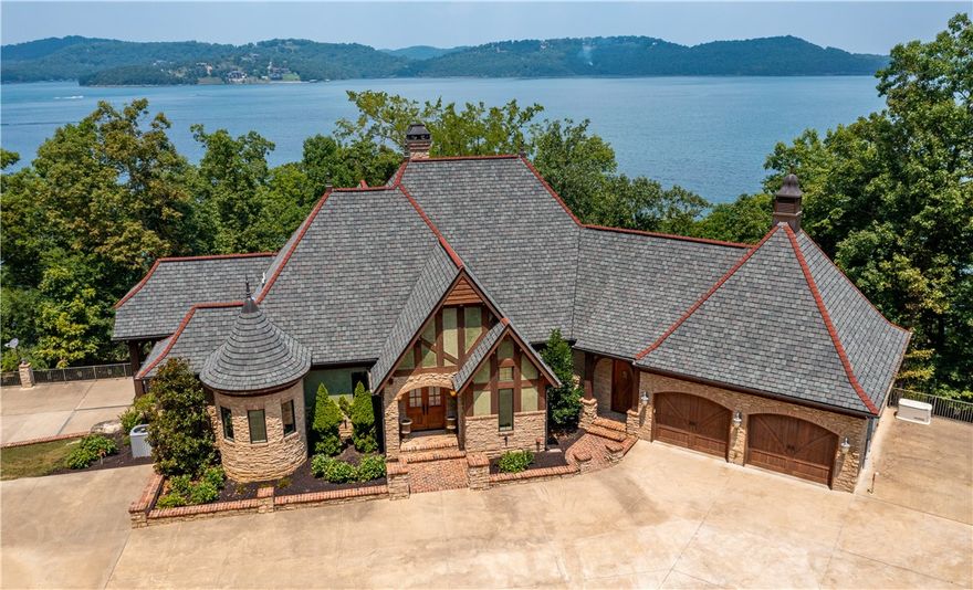 Custom designed by Architect Ron Hill of Euro World Designs, this impeccable Beaver lakefront home with VIEWS VIEWS VIEWS and PRIVATE DOCK, boasts 2 kitchens, 2 laundry rooms, a "bunk room" serves as a 4th bedroom with adjacent full bath & huge walk-in closet. Master has separate "his & her" bathrooms, other bedrooms en suite. Part of downstairs ideal for mother-in-law quarters or Airbnb. Numerous outdoor living spaces overlooking lake and an easy short walk to PRIVATE 2-slip boat DOCK with swim platform. Heated/cooled 1,824 sq ft shop with kitchen & bathroom has live wells for bait/fish. Endless possibilities with this shop. Eagles nest on acreage. The custom details in this property are too extensive to list here, ask your agent for amenities list. Seller willing to negotiate furnishings with acceptable offer. Security system with surveillance. Pre-qualified Buyers only.