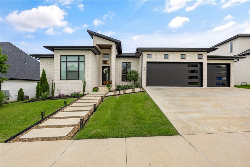 Welcome Home to your single story Shadow Valley home built in 2021. It has the perfect mix for family functionality and is an entertainers dream, with everything one would expect in a gated golf community. Thoughtful design abounds: custom cabinetry with pull out drawers, wood flooring throughout, a dining room that comfortably seats 10+ fashioned with chic accented walls. The fenced in back yard and covered porch, fireplace, and TV hookup allows for easy enjoyment year around. A spacious living area, bonus/flex room with beverage center, walk-in pantry, and elegant hardware finishes this home is sure to wow anyone. You can relax in the gorgeous primary suite, offering an oversized walk-in closet, and laundry room with sink and storage. Laundry room connects to the primary bath closet, literally a dream layout. Check out the mudroom and the freestanding storm shelter as well! (One of fhe bedrooms is currently being used as an office,)