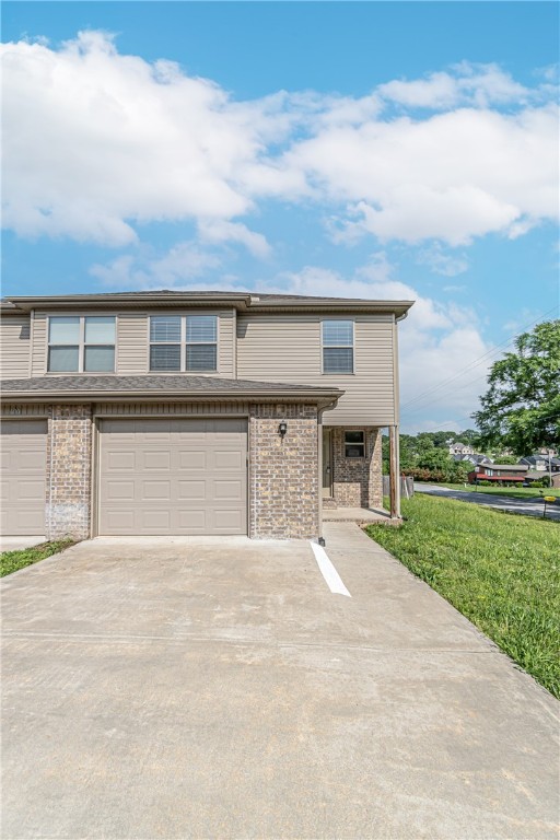 3 bedroom 2 1/2 bath duplex with all appliances - Solid surface flooring in kitchen & living room.