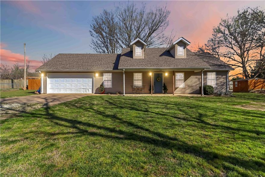 Charming 3-bedroom, 2-bath home with a 2-car garage, built in 2004 and featuring a brand-new roof in 2026. Located within walking distance of downtown Lincoln, this home offers the perfect blend of small-town charm and convenience. Inside, you'll find wood laminate flooring throughout the living room and all bedrooms, with tile flooring in the kitchen, bathrooms, and laundry room. The spacious living room features high ceilings and a cozy fireplace with gas logs, creating a warm and inviting atmosphere. Enjoy relaxing on the covered front porch overlooking the large front yard, complete with an in-ground storm shelter for added peace of mind. Experience the comfort and charm this cute home has to offer in a welcoming country-town setting.