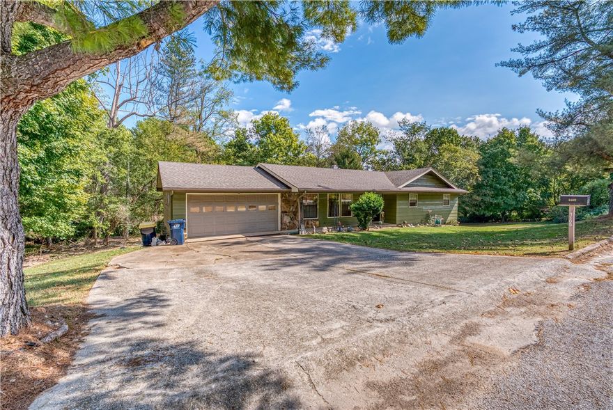 Welcome to 1105 Maria Drive! This spacious home sits on nearly an acre in the highly sought-after Speer Heights subdivision. Featuring a comfortable open layout with an inviting gas-log fireplace, large living area, and an eat-in kitchen perfect for family gatherings. The split floor plan offers privacy and flexibility for guests or a home office. Enjoy the peaceful, park-like setting with mature trees and plenty of yard space for outdoor activities or gardening. The attached garage and concrete driveway provide convenience and extra storage. Located just minutes from Skyline Elementary, shopping, and downtown Harrison, this property combines small-town charm with modern comfort. A wonderful place to call home for those seeking space, value, and a welcoming neighborhood atmosphere!