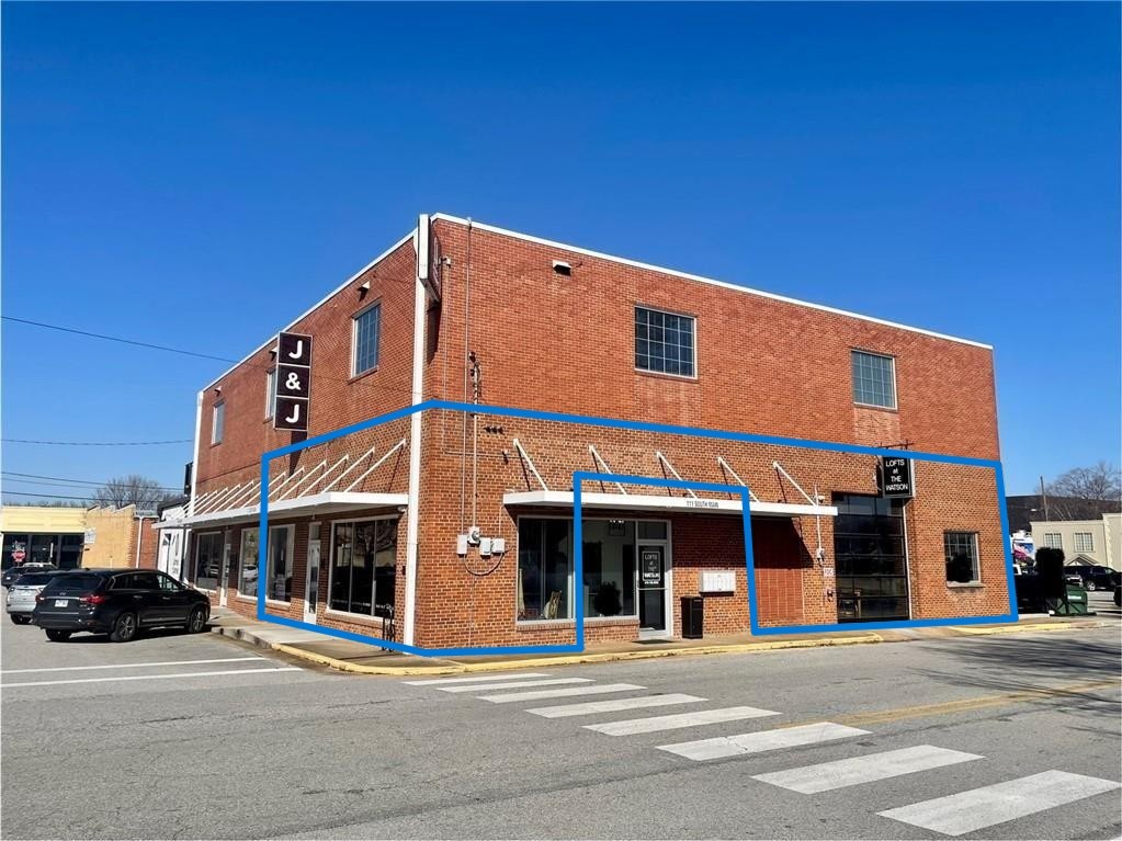 Now available for lease: 2,049 SF of prime commercial space in historic 'The Watson' building in the heart of Downtown Springdale. Suite C is a corner unit with premium frontage, offering excellent visibility and accessibility. This ground-level space features a covered entrance and use of the prominent lightbox sign frame located at the corner of the building. Renovated in 2020, the space blends urban industrial character with modern functionality. Enjoy open ceilings, exposed brick walls, large picture windows, a glass panel overhead door, & polished concrete floors. Fully sprinkled, the suite is adjacent to free city parking lots and street parking. Located within the Downtown Springdale Arts and Outdoor Dining Districts, this property sits just 0.1 miles from the Razorback Greenway and is steps from Emma Avenue. This suite is ideal for retail, office, creative studio use, and more. Don’t miss this rare opportunity to lease a space in one of Northwest Arkansas’ most vibrant and revitalized downtown communities!