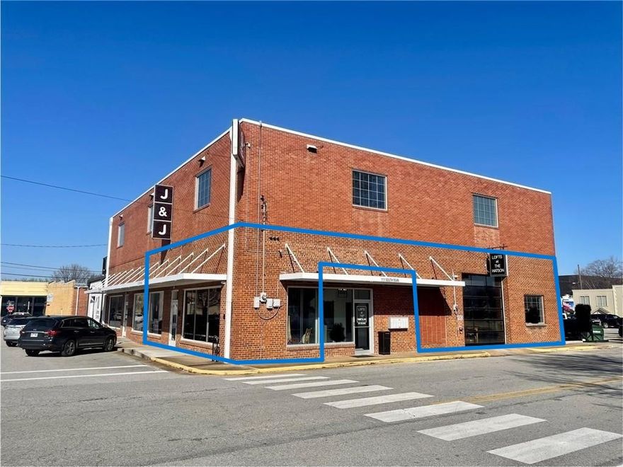 Now available for lease: 2,049 SF of prime commercial space in historic 'The Watson' building in the heart of Downtown Springdale. Suite C is a corner unit with premium frontage, offering excellent visibility and accessibility. This ground-level space features a covered entrance and use of the prominent lightbox sign frame located at the corner of the building. Renovated in 2020, the space blends urban industrial character with modern functionality. Enjoy open ceilings, exposed brick walls, large picture windows, a glass panel overhead door, & polished concrete floors. Fully sprinkled, the suite is adjacent to free city parking lots and street parking. Located within the Downtown Springdale Arts and Outdoor Dining Districts, this property sits just 0.1 miles from the Razorback Greenway and is steps from Emma Avenue. This suite is ideal for retail, office, creative studio use, and more. Don’t miss this rare opportunity to lease a space in one of Northwest Arkansas’ most vibrant and revitalized downtown communities!