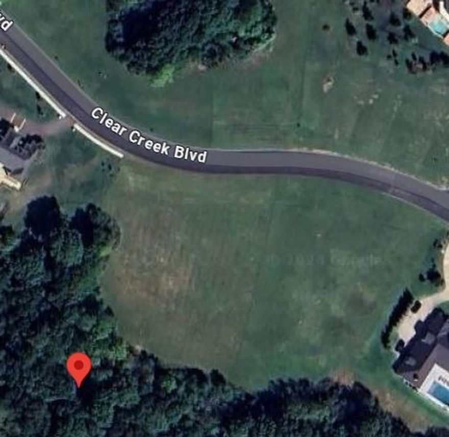 3.15 acre lot located in prestigious Clear Creek Subdivision