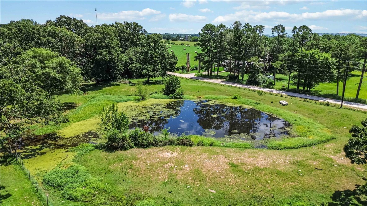 Ready for YOUR Own Slice of Country Living with Zero Down? With an RD loan that is possible!
Nestled on 3.52 serene acres just 20 minutes west of Fayetteville, this beautifully remodeled 4-bedroom, 2-bath home offers 2,143 sqft of modern comfort with peaceful country living. Fully updated in 2023, this spacious home blends rustic charm with contemporary finishes, creating the perfect setting to grow your family.
Step outside and discover a spring-fed pond that is fully stocked with bass, perch, and catfish, fully fenced acreage ready for cattle or goats, and a chicken coop ready for your feathered friends! Whether you're starting a hobby farm or simply craving room to roam, this property is already set up for your rural lifestyle.
Enjoy the best of both worldsāquiet country life with convenient access to town. Donāt miss your chance to own a slice of Arkansas paradise! Only $365,000!!!