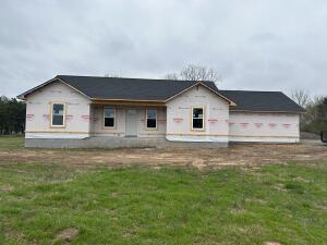 New home with a nice view. Front covered porch, split floor plan. Tray ceiling, energy efficient, custom cabinets, tile shower, vinyl plank flooring, auto garage opener, well insulated in the Ludwig community.