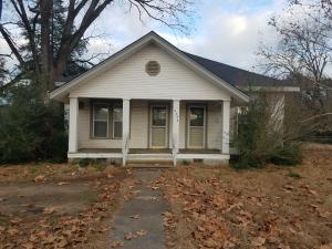Why rent when you could buy this home with payments lower than monthly rent?Cozy home with over sized 1.25 acre lot in Dover. Fenced area for a dog and a huge back yard to imagine the kids playing. Located walking distance to dining, grocery, and schools. Interior of the home was upgraded adding insulated windows and central heat & air. It also still has many of the original features such tall ship lap ceilings, original glass door kitchen cabinets, and solid oak board walls. This could be your own Chip and JoAnna project or just move in.