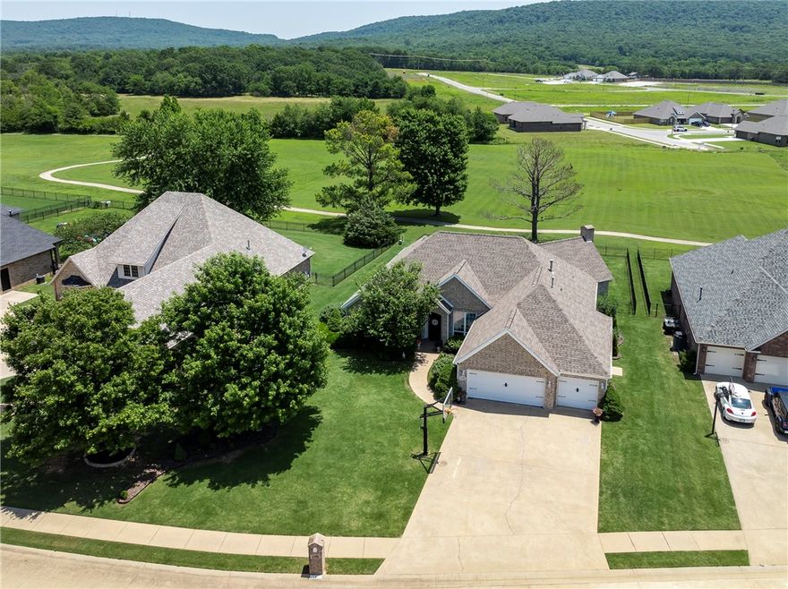 $4000 to buy down rate or use for closing costs with the right offer! Immaculate one owner home backing to walking/biking trail and enormous common space beyond the fence and amazing views of Kessler Mountain in a peaceful neighborhood. If only photos could show the quality of this one level home...Flawless. Formal living and dining rooms will greet you as you come inside. But just around the corner is the space you won't want to leave! The open plan of the great room, kitchen and dining space is cozy AND grand! Check out that primary bedroom ensuite and that wrap around closet is a dream! The secondary bedrooms have ample closet space.  Lots of storage galore.  Oversized garage. All carpet has been removed and replaced with high quality LVP. School of choice. Please ask your agent to share the attached breakdown of so many of the amazing custom features of this home.  They are too numerous to mention. Meticulously cared for home that you don't want to miss, in a very sought after area. Only 8 minutes to the UofA!