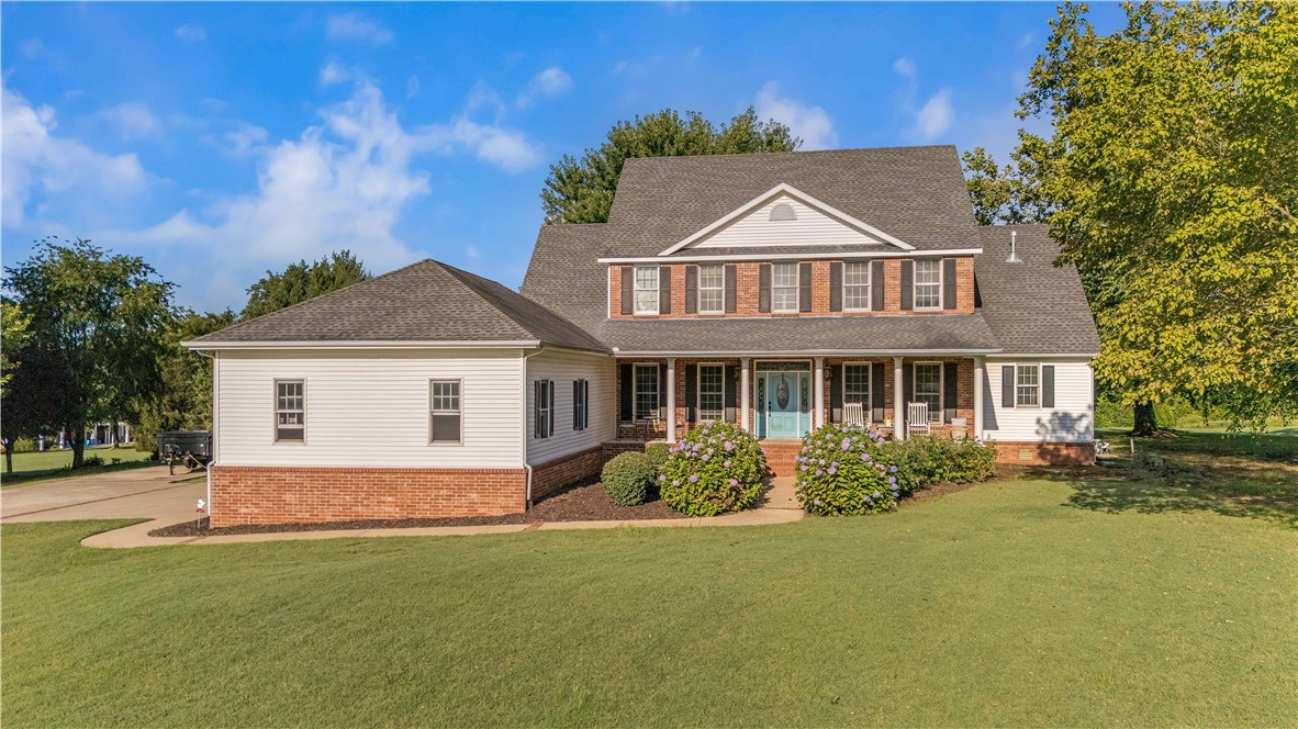 Discover the perfect blend of privacy and elegance at 2247 Heather Cove. Nestled on 2 serene acres, this estate-like property offers 3,430 sq ft of living space with 5 bedrooms and 4.5 baths. A welcoming front porch sets the tone for relaxing early mornings or peaceful evenings and leads into a thoughtful layout featuring a cozy den/office, formal dining room, inviting living area, and a spacious kitchen anchored by the main-level primary suite. Upstairs, you’ll find four additional bedrooms, providing plenty of room for family or guests. Outside, enjoy a private pool—liner and cover replaced in 2022—perfect for warm Arkansas days. A neighborhood walking trail sits just beyond the back of the parcel, completing this rare combination of luxury, comfort, and outdoor lifestyle. Don't miss this one - book your showing today.