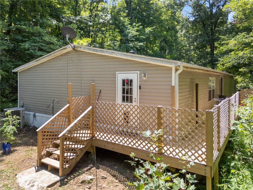 Secluded Country Living with Space to Roam

Welcome to 18015 Stout Mountain Road — where peace and privacy meet comfortable living. This spacious 2280 sq ft doublewide home, manufactured in 2008, offers 3 bedrooms, 2 full bathrooms, and a bonus room perfect for an office, hobby space, or a potential 4th bedroom.

Nestled on 6.12 acres, you’ll enjoy the beauty of the outdoors with around 5.12 acres of wooded land full of wildlife, and 1 cleared acre surrounding the home. This property is ideal for those who crave nature, hunting, or simply want to escape the hustle of town.
Additional spots for shop or house.

Recent updates include a new roof in 2024, and all appliances (just 1-2 years old) will stay with the home — making this move-in ready.

Whether you're looking for a permanent residence, weekend getaway, or a place to grow and breathe, this one checks the boxes for privacy, comfort, and value.