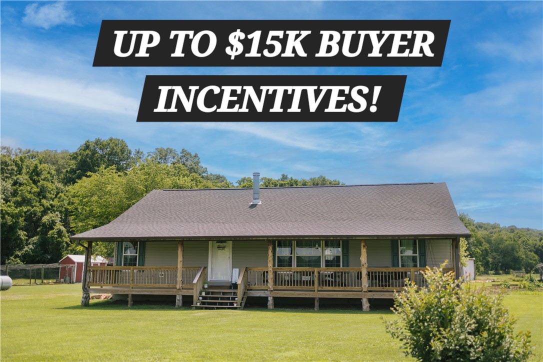 Seller will pay up to $15K in concessions for qualified buyers to use for applicable rate buy-down options, other lender allowables, closing costs, prepaids, etc.
This 3-bed, 2-bath home on 5 acres offers stunning sunrises from its spacious covered front porch. Inside, a wood-burning fireplace enhances the large living room, which flows into an eat-in kitchen with ample storage. A large deck off the kitchen provides outdoor space in this beautiful country setting.