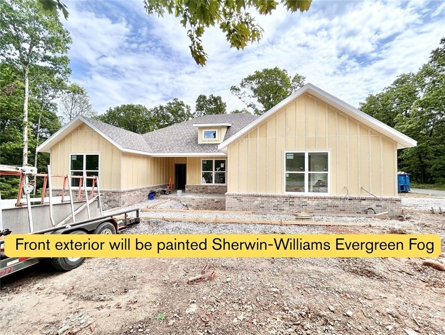 Stunning new construction home on a .69 acre double wooded lot with flat backyard located right next to Branchwood Recreation Center and Trails! Also within close proximity to Highlands Golf Course, Lake Loch Lomond, and I-49! Step inside to discover a beautifully designed interior with 4 bedrooms, a split floor plan, & high-end modern finishes throughout. 2 car side load garage! The spacious living area showcases vaulted ceilings with elegant beams, creating an inviting atmosphere. The kitchen features sleek 3 cm quartz countertops, a gas range, custom cabinets, and stainless-steel appliances. Retreat to the luxurious primary bath, which boasts a huge walk-in closet, a large custom walk-in tile shower, and a soaking tub. 2 covered patios. As an added bonus, receive $3,500 towards buyer's closing costs when working with the builder’s preferred local lender! "Front exterior will be painted Sherwin-Williams Evergreen Fog"