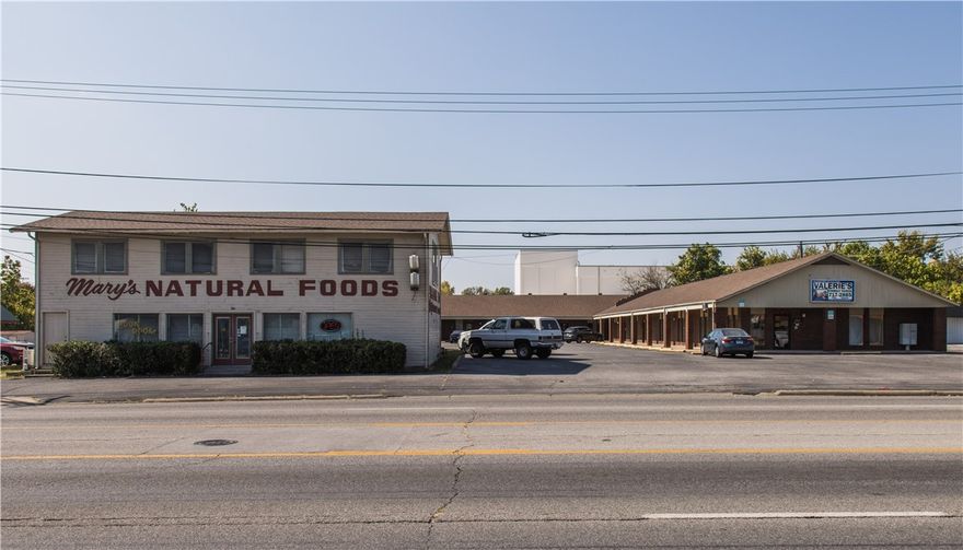 Outstanding Investment Opportunity- 2 commercial buildings on 2 parcels totaling 1.2 acres. Buildings are fully leased & have Hwy 71B frontage. 210 S Thompson St (called Thompson Plaza) is a brick office complex built in 1985 with 10,116 sqft & 7 individual units. Unit 4 has been split into 4A & 4B for use by 2 separate tenants, but they can also be used together. This L-shaped building has a covered front walkway & has a pylon sign. It also has tenant common areas which include 2 conference rooms, 2 kitchenettes, 2 mechanical rooms & 4 bathrooms. 220 S Thompson St is a one tenant building with 3016 sqft of retail space & it was built in 1944. This parcel would be perfect for future redevelopment & you can keep the rent coming in until you're ready. These buildings have an outstanding, highly visible location with a 30,000+ daily traffic count & close to Downtown Springdale, Huntsville Ave, Northwest Medical Center, Springdale Public School Admin Building & more. Property is zoned C-2. Please do not bother tenants.