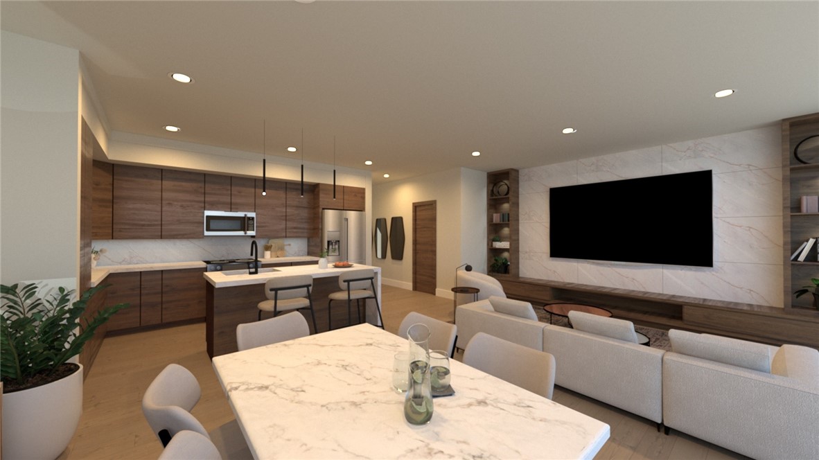 The townhomes at Parkside of Lowell showcase a modern aesthetic with thoughtfully designed open floor plans. Every unit features premium finishes, including quartz countertops, stainless steel appliances, and upscale luxury vinyl oak flooring. All-electric systems ensure energy-efficient heating and cooling for comfort and cost savings. Parkside combines contemporary design with an active lifestyle, with no restrictions on short-term rentals, making it a prime investment opportunity. Residents enjoy amenities like a clubhouse, gym, pool, and direct access to the Razorback Greenway for endless outdoor adventures. The community is centered around Kathleen Johnson Park, soon home to the NWA Space and Science Center, a soon to be major destination in NWA. The new flex space adds value with a mix of restaurants, businesses, and storage solutions for residents. As Lowell continues to grow in the NWA region, Parkside remains a standout community.