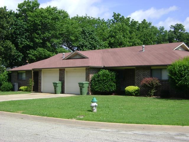Great 2 bed & 2 bath duplex in Rogers! Recently updated with all new flooring, paint, light fixture in the master bedroom, and new refrigerator in the kitchen!