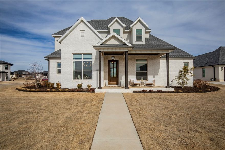 Previously showcased in the esteemed '21 NW Arkansas Parade of Homes, this luxury residence in Shadow Valley's Phase 10 gated community is a testament to elegance and style. Nestled on the 15th fairway, the 4 bed/3.5 bath home features an office with beautiful built-in cabinetry, a large bonus room with a built in desk & kitchenette, a heated pool with sunset views, built-in hot tub, and an outdoor kitchen, creating a haven for lavish living. As an added bonus, the social and racket club membership will transfer at no add'l cost (a $3,800 value).  The chef's kitchen will elevate your cooking experience with a gas range, professional refrigerator, double ovens, walk in pantry, and a dry bar.  The open floor plan creates a space for effortless entertaining. The living room boasts a gas fireplace and double sliding glass doors that allow the light to flow in.  This home has style, opulence, and a desired location near shopping, restaurants, and the Walmart AMP.  Seize the opportunity to call this exquisite home yours.