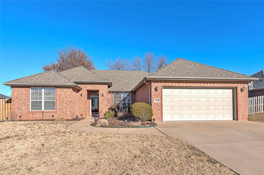 One-level, Move-In Ready, All Brick home in desired Fayetteville area!  Tons of great finishes in this well cared for home, with a great backyard & patio for entertaining.  Established area in West Fayetteville, near Holcomb Elementary.  Layout features a split floor plan with three bedrooms on one side, and the primary suite opposite.  Open kitchen area and a cozy living room with a gas log fireplace.  And you have to see the awesome bonus shed / outdoor office!  This super cute outbuilding is totally finished, with electricity, a wall unit AC / Heater, and it's own hardwired internet connection for office use.  House features also include an RO water filter, a water softener system, and a security system (subscription needed).  Roof and HVAC both new in 2022.  Landscaping includes sprinkler system, and see the photos of the beautiful roses and other flowers when in bloom!  Homes in this area don't stick around long, schedule a showing now.