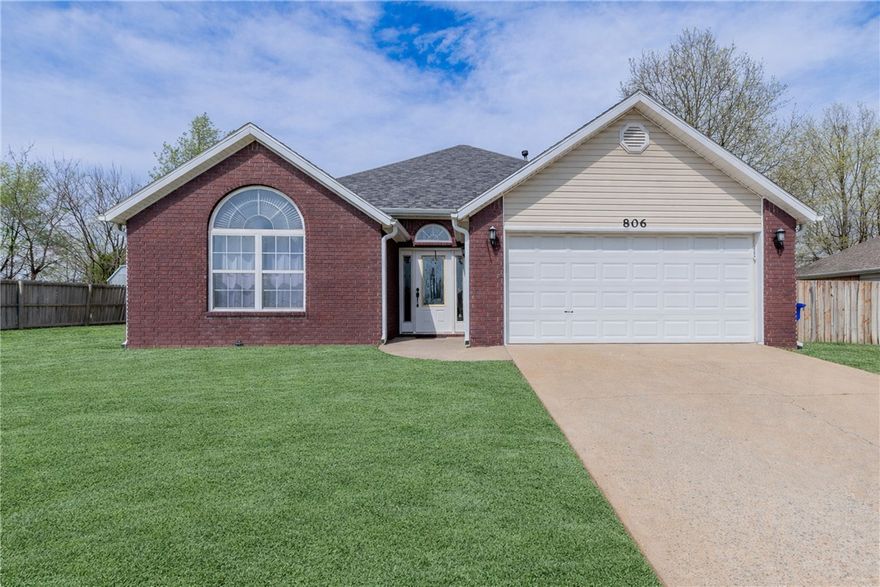 Prime NWA location! This stunning brick home adjacent to Ward Nail Park features an open layout with 10' ceilings, crown molding and beautiful hardwoods.  Highlights include a gourmet kitchen with granite countertops, stainless steel appliances and a gas range, a spacious primary suite with jetted tub and walk-in closet and a peaceful backyard overlooking an open field. Enjoy the convenience of I-49 access and the charm of this well-maintained home.