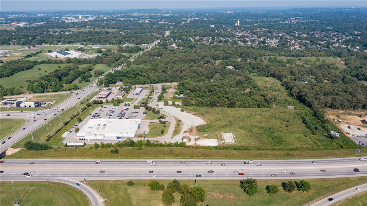 5.32 acres located off Don Tyson with high visibility frontage on I-49. Minutes from Tyson HQ, Arkansas Children's Hospital, Arvest Ball Park and other key developments. All utilities on site.
Geotechnical report available along with recent survey. This 5.32-acre parcel is part of the 7.79 acre tract and will be split prior to closing.