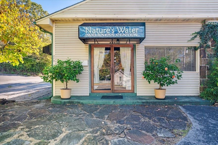 Zoned, Downtown General, this very established property has enjoyed full occupancy of therapists, a veterinarian, a water filtration company and other practitioners of wellness, some of whom would like to stay on, but have a month-to-month arrangement.  There are 8 private office spaces, plus a large central room with kitchenette, and an entrance room-waiting room.  The lot has nice shade trees, there are 16 parking spaces, the location is only 4 blocks from the square in Fayetteville.  A major re-do and addition was done in 1992.  Improved price!