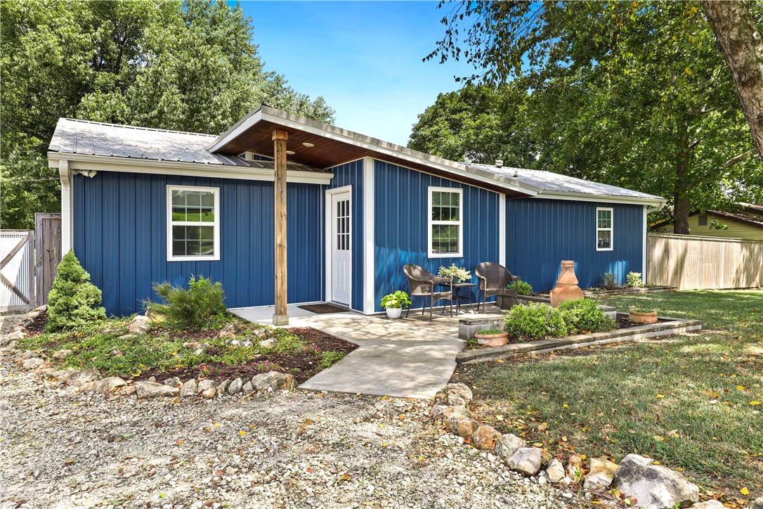 Welcome to your dream home in Prairie Grove! This charming 3 bed 2 bath home underwent a complete custom remodel in 2019 with metal roof, siding, windows, PVC flooring, barn doors, kitchen, mud room and much much more! Location Location Location!⦠this home is zoned A-1 and is bordered on two sides by Prairie Grove Battlefield, which means no possibility of development behind or to the side of you. Youāre sure to fall in love with the serenity, panoramic views and sunrises enjoyed from the extensive back deck and large picture windows. Not only does this home exude character, but itās also conveniently within walking distance to schools and historic Main Street shops. Donāt let this one pass you by.