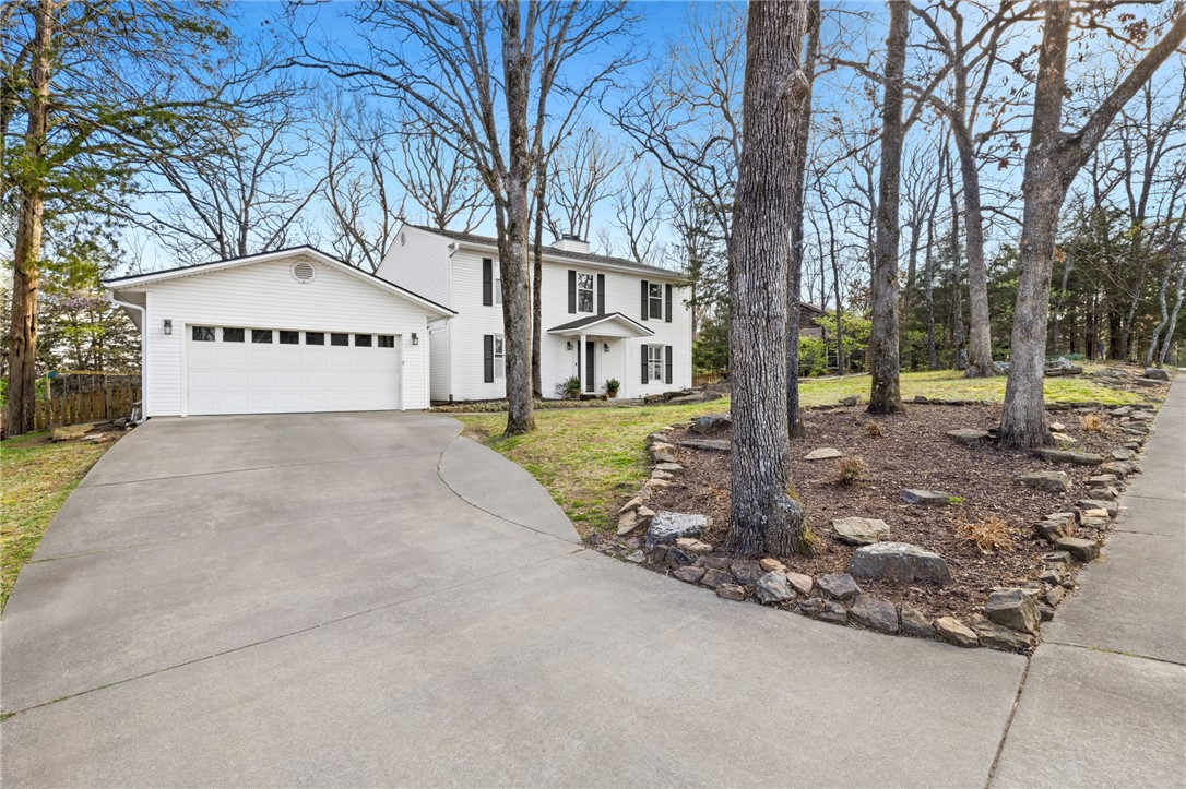 The second you drive by this southern charming home, you will fall in love. This 3186 square foot home has been completely remodeled by the current owners who have lived here for 17 years. It is a two story home with three bedrooms located upstairs, including the primary bedroom and primary bath. A current media room located on the first floor could also be used as a primary bedroom. Beautiful hardwood floors are located throughout the first floor. The updated kitchen opens up to the living room. Off the living room is a reading room that could be used as an office or second living room. The outdoor patio is a great place to sit and enjoy the backyard. The home backs up to woods giving lots of privacy. The neighborhood pool and pavilion are located at the end of the quiet cul de sac just down the street.