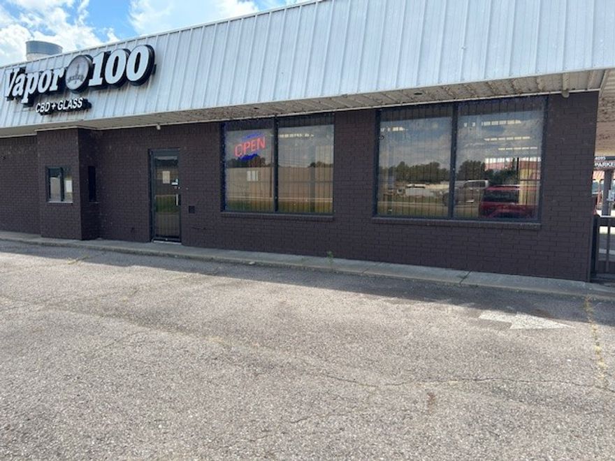 Location, Location, Location!  This retail building sits near the intersection of Hwy 7 and Hwy 28 in a very high traffic area in front of the Dardanelle Walmart. Currently a smoke shop with a lease in place at $3,000 per month.  Retail area has been remodeled with new vinyl plank, paint and everything needed for a great retail space.  Drive thru window. Rear of building is set up for a restaurant kitchen, complete with a walk-in freezer, commercial sink, large stove & vent a hood. Great investment property.
