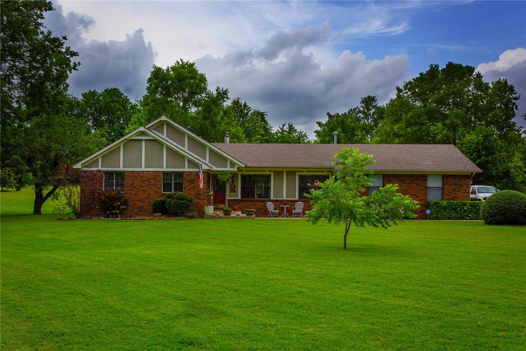 3 bedroom, 2 bath home on 1.4 acres in desirable neighborhood. Oak cabinets, granite counter tops, home has 2 outbuildings, one could be used for entertainment / workshop and one could be used for detached garage, storage or workshop. Also has RV hooking on the property.