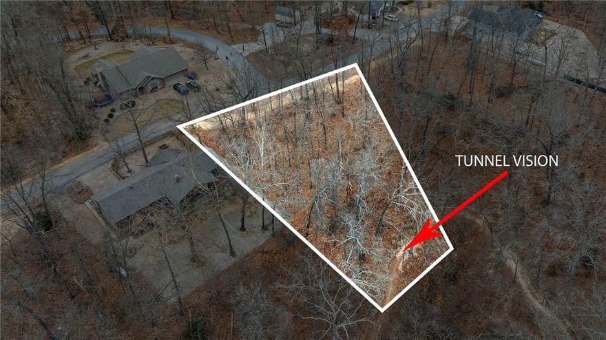 Great, hard to find building lot with Mountain Bike Trail Access & Little Sugar going through the back corner of the property. The Lot has already been perc tested for a 3 bed house.3 Miles to new OZ Bike Park by car. Tunnel Vision connects by trail to ride straight to the park set to open Summer 2026, & is also connected to miles of single track right out the back, but thats not all! Scottsdale Golf Course is 1.5 miles away, and 2 lakes; Lake Avalon & Lake Loch Lomond are less than 10 minutes away.Common property buffer on one side for additional privacy! Come build your dream home.