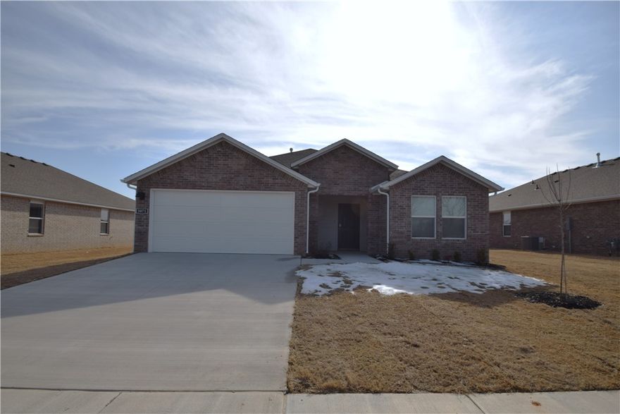 Brand new Home with New appliances including washer, dryer and Refrigerator.  Wood Privacy fence going in as well.  This home is in the West Wind Community and features granite countertops, stainless-steel appliances, pantry, 36-inch cabinets, and LVP flooring throughout. This home has an open floor plan and the primary bath includes double sinks and a walk-in shower and large walk-in closet. The secondary bath with a tub/shower combo, and a brick exterior with a covered patio.  This is a non-smoking property, and pets are negotiable with owner approval and an additional deposit.  While located within Centerton city limits, please note that mail is handled by the Gravette Post Office and properties will use a Gravette zip code.
