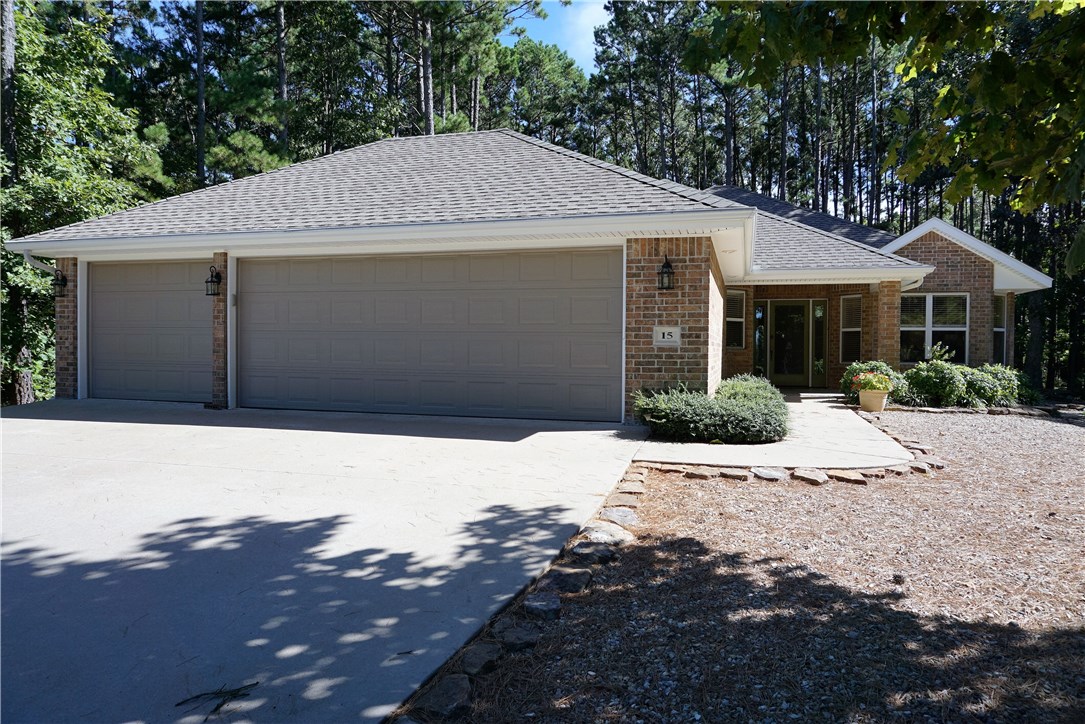 Custom built, full brick, 6 inch walls, roof replaced 5 years ago. Dishwasher and Microwave replaced. HVAC has propane backup. Professionally landscaped with water feature, many azaleas. Screened porch. Very private. Woods on 3 sides. Bentonville School district and only 1 mile to Walmart! Must See! Agent Owned