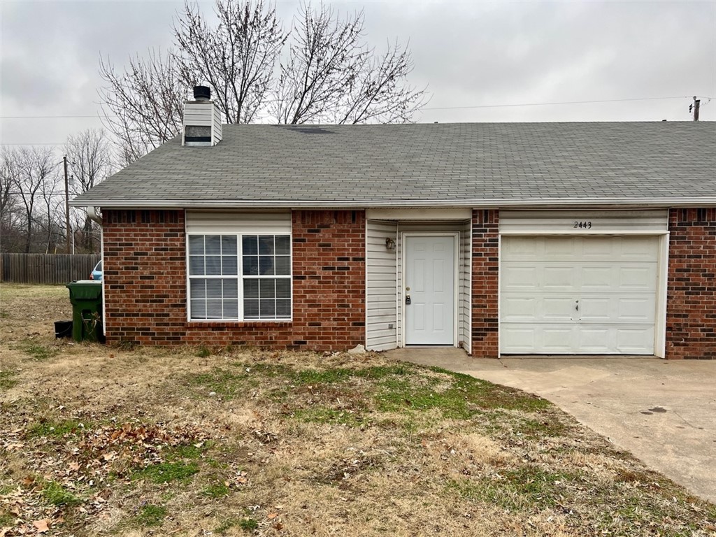 Nice duplex in Rogers. Home features vinyl wood flooring in downstairs bedrooms, vinyl wood in living room complete with wood burning fireplace, carpet in upstairs master bedroom, & all appliances.