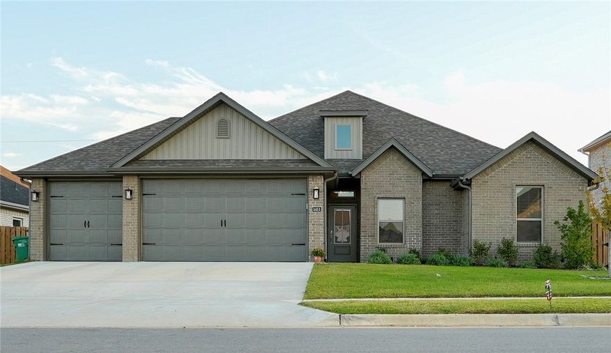 This stunning all-brick home, built in 2024, combines modern luxury with lasting quality. Featuring a fully fenced yard, gutters, and a spacious "3-CAR GARAGE", it’s move-in ready. Inside, the open split floor plan is filled with natural light, showcasing a "VAULTED CEILING" in the living room and large windows throughout. With 4 bedrooms and 2.5 bathrooms, the home offers comfort and style. The kitchen boasts custom cabinetry, 3CM granite countertops, stainless steel appliances, and a gas cooktop—perfect for cooking and entertaining. "REFRIGERATOR,WASHER & DRYER included". The luxurious LARGE primary suite offers two walk-in closets, a tiled shower, and a soaking tub for ultimate relaxation. A covered patio extends to a serene outdoor living space. Ideally located, this home is minutes from top-rated schools and the new home office campus, all while maintaining a peaceful, country-like atmosphere. Don’t miss this exceptional opportunity!