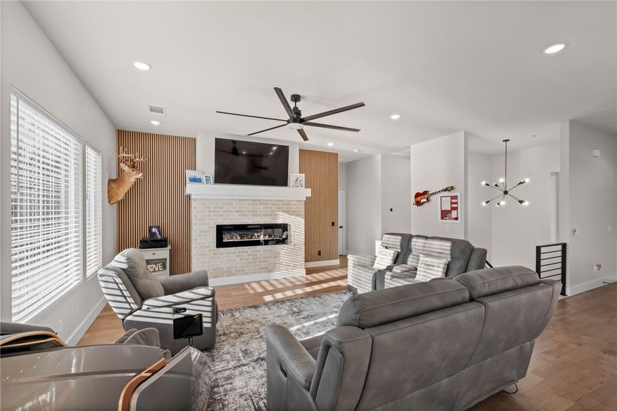 Modern design meets wooded serenity in this stunning new-construction home. Clean lines, designer exterior finishes, and expansive windows create a bright, contemporary feel throughout. A sleek entry, open layout, and elevated architectural details set this home apart. Enjoy seamless indoor–outdoor living with a large covered deck and spacious lower patio overlooking the trees—perfect for relaxing or entertaining. A rare Bella Vista find offering privacy, style, and quality craftsmanship in a peaceful setting. Builder includes a 1-year warranty, and buyers may receive a $2,500 lender credit when using a preferred lender.