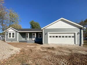 this is your opportunity to own a brand new, contemporary home in Green Forest. Outside is LP smart siding also called composite lap siding. Interior is painted white over orange peel textured walls. The floors are a beautiful laminate flooring. Walk in closet in master, washer and dryer connections and pantry. This one is a blank canvas ready to decorate to your own tastes