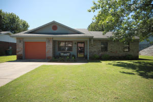 Very clean, neat and affordable 3 bedroom home. This home has 1 1/2 baths, laundry room, privacy fenced yard & garage. Brick exterior makes for easy maintenance. Covered patio in back. Includes storage building. Great location in Russellville.
